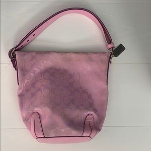 Pink coach monogram bag.